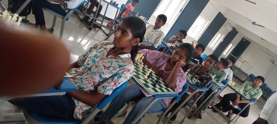 Students competing at a state-level chess tournament